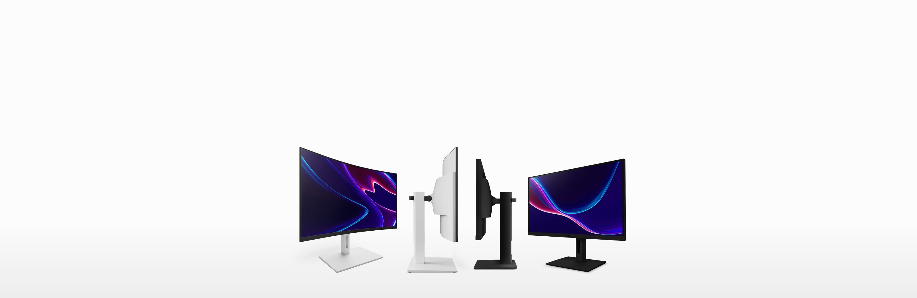 Four computer monitors are arranged in a row, two in white and two in black, with the curved screens facing outward and side profiles shown in the center, all displaying abstract wavy lines on their screens.