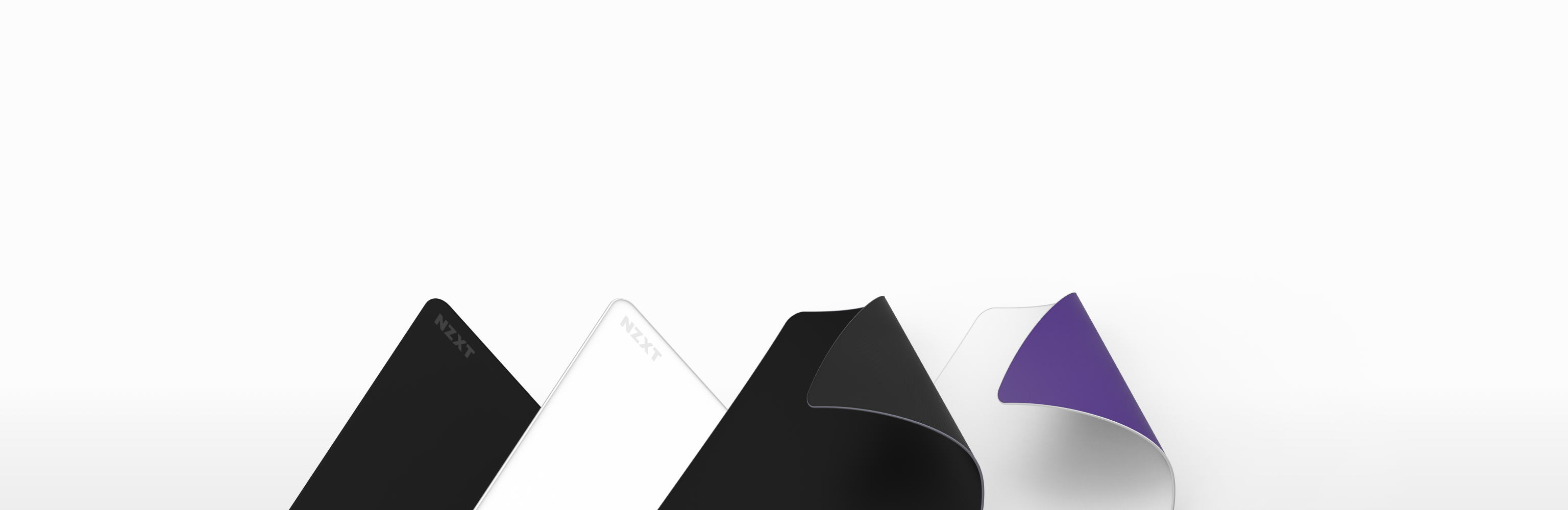 Four sheets in black, white, grey, and purple are layered and partially curled against a white background, creating a modern abstract design.