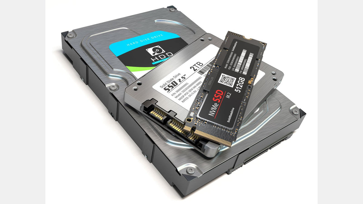 3.5-inch hard disk drive stacked under a 2.5-inch SATA SSD and an M.2 NVMe SSD