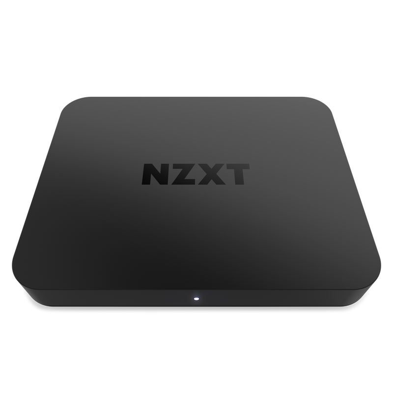 The NZXT Signal HD60 is a sleek, black rectangular capture card with rounded edges, the NZXT logo on top, and a white indicator light in front, designed for ultra-low latency and zero-lag passthrough performance.