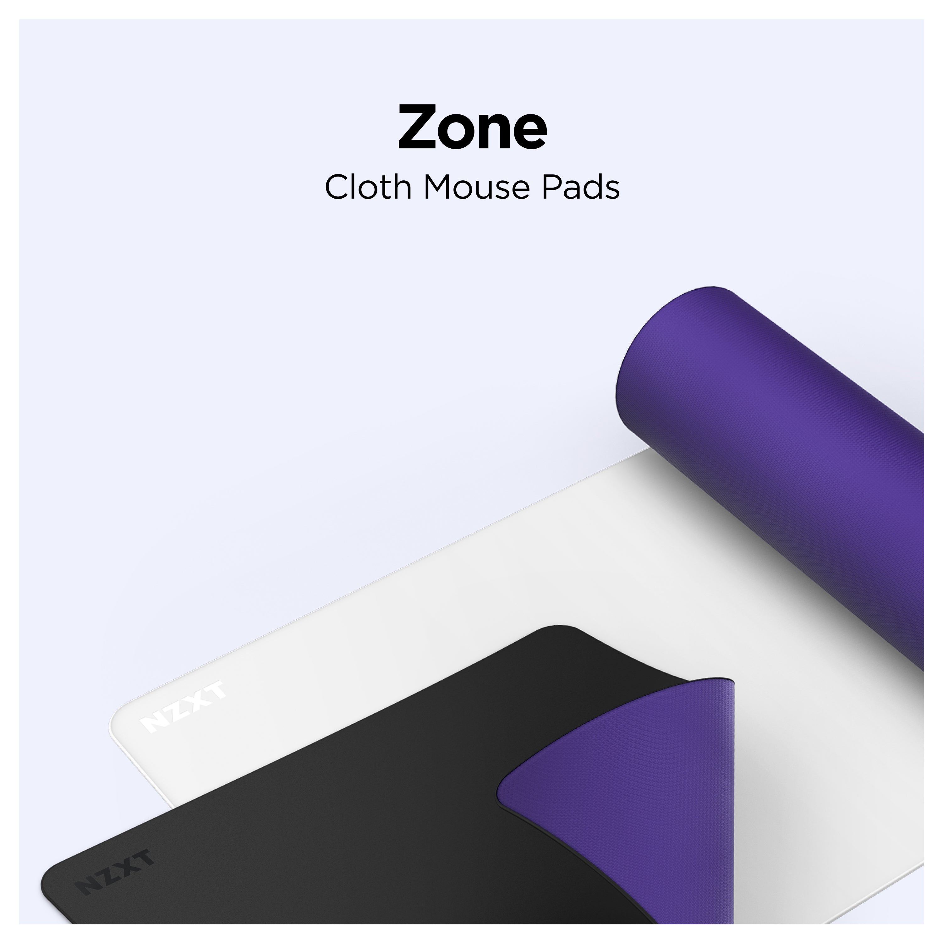 A product image showing NZXT Zone cloth mouse pads in black, white, and purple colors, with one pad partially rolled and the others lying flat on a light background. Text above reads Zone Cloth Mouse Pads.