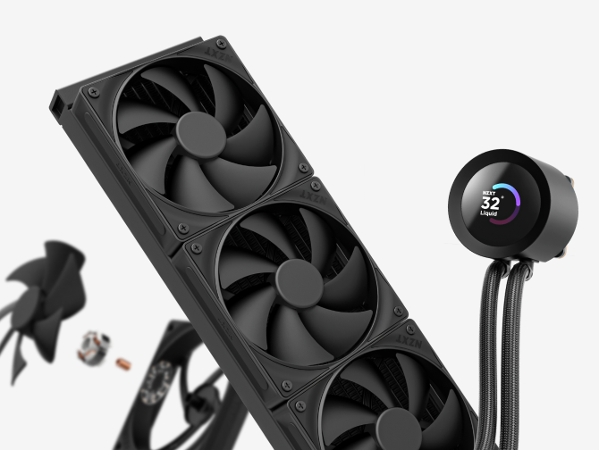 A close-up of a liquid CPU cooler with three large black fans on a radiator and a round digital display showing 32° Liquid attached to two braided tubes, with additional fan components in the background.