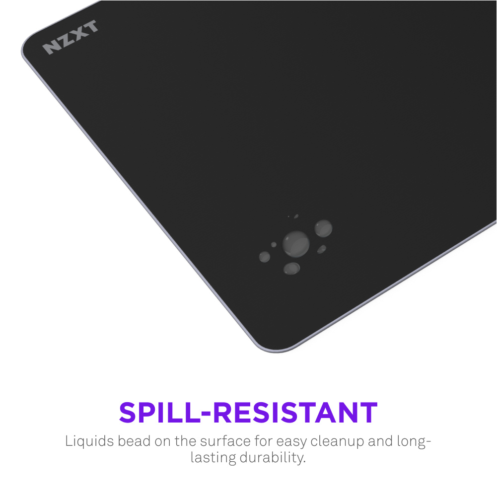 A close-up of a black NZXT Zone Elite mouse pad with water droplets beading on its ultra-smooth, spill-resistant surface. Text below reads: SPILL-RESISTANT. Liquids bead up for easy cleanup and lasting durability.
