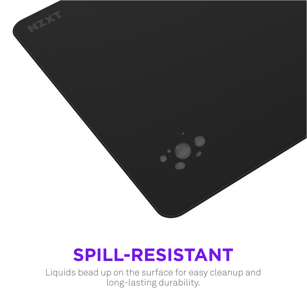 A black NZXT Zone 2XL mousepad shows water beading on its micro-weave cloth, highlighting the spill-resistant coating. Text reads: SPILL-RESISTANT—liquids bead up for easy cleanup and lasting durability.